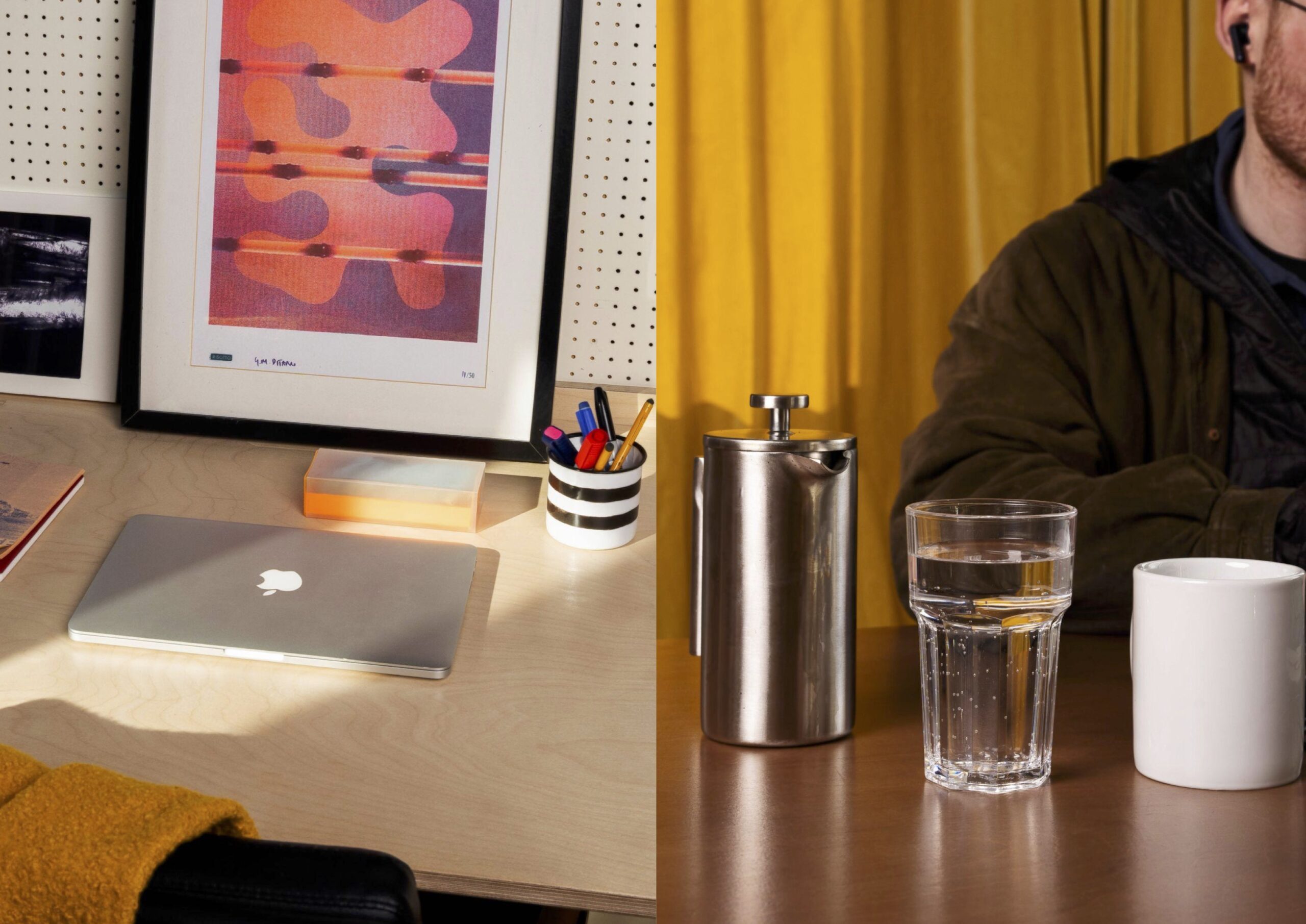 A split image of the fixed desk and a hot desk at Civic House. On the left is a view of an office set up at the fixed desk with a MacBook, a cup of pens, and posters hung on the peg board. On the right is a cafetiere, a glass of water, and a mug sitting on one of the hot desks with a partial shot of a coworking member at their laptop.